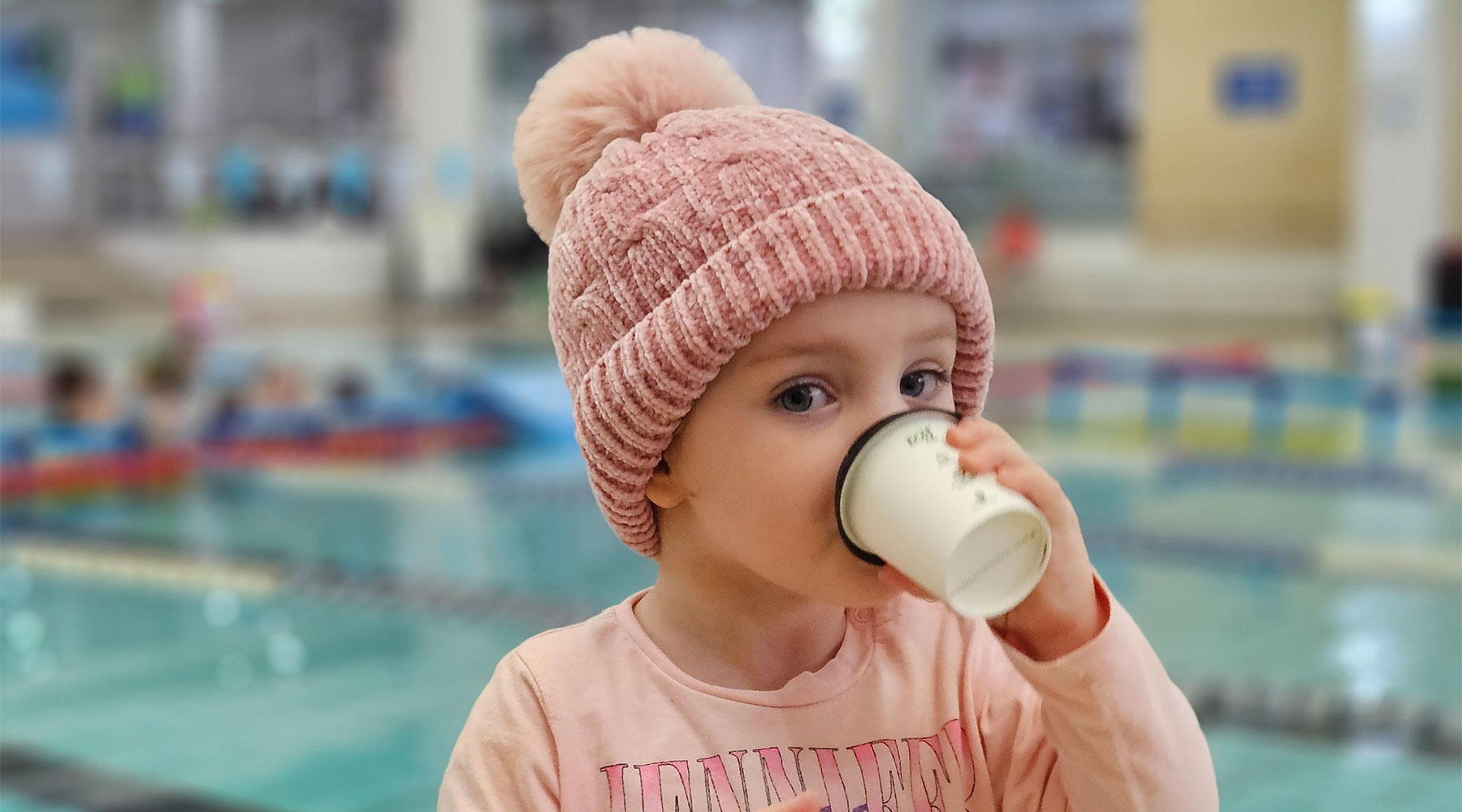 In2Swim students enjoying a hot drink after swimming lessons in winter