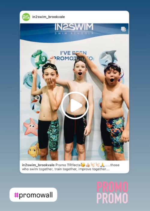 Celebrating a achievement in their swimming journey at the promo wall